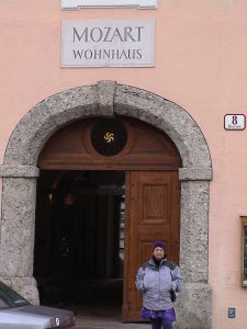Rozie stands in the entrance to Mozart's home in Salzburg.